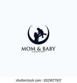 Mother holding a little baby logo design vector