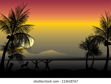 mother and kids relaxing on the beachfront in the evening
