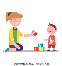 Mother or kindergarten teacher teaching a child alphabet with letter wooden bricks blocks. Modern flat style vector illustration cartoon clipart.