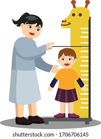 Mother is measuring her daughter height