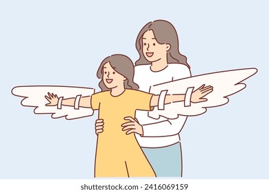 Mother plays with daughter using imaginary wings to motivate child for achieve goals. Caring mom wants to raise confident girl and motivates daughter for win and have no fear in overcoming problems