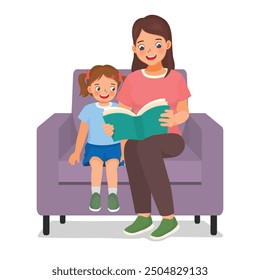 Mother read book with her daughter sitting on couch