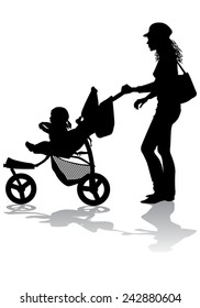 Mother rolls the baby in the stroller for a walk 