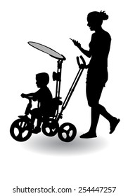 Mother rolls the baby in the stroller for a walk 