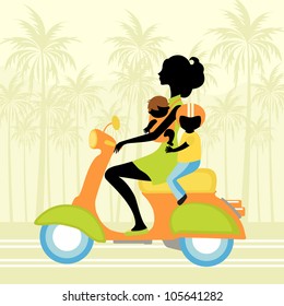 Mother scootering with two kids