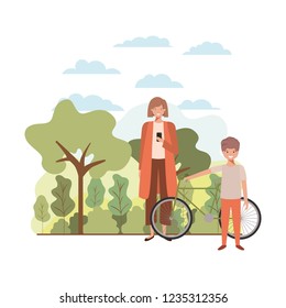 mother and son with bicycle in landscape