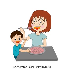 mother and son eating on the table