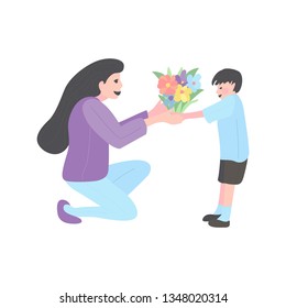 Mother and son. Mom with her child boy. boy gives flowers to woman