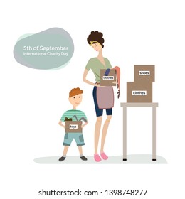 Mother and son prepare charity boxes. Good to illustrate topics about charity, donations.