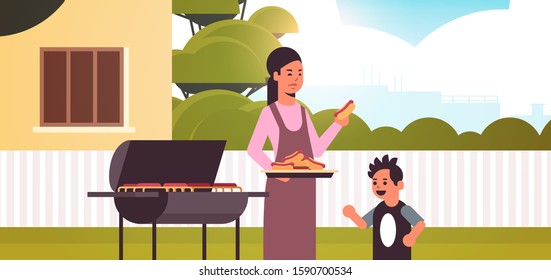 mother and son preparing hot dogs on grill happy family having fun backyard picnic barbecue party concept flat portrait horizontal vector illustration