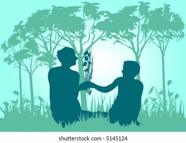 mother and son siting on grass