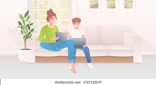 mother with son using laptops happy family spending time together modern living room interior full length horizontal vector illustration