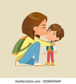 Mother squatting kissing son on cheek. Mom with backpack praises, caresses her cute baby boy