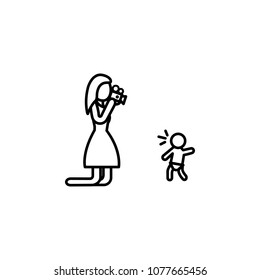 the mother takes the first steps of the child on the camera icon. Element of family for mobile concept and web apps. Thin line  icon for website design and development on white background