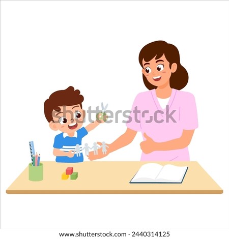Mother teach her child to using scissors cutting paper. Creative family activity for kids to improve hand and fine motor skill for development and attention span.