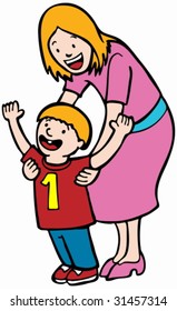 Mother Teaching Child : Mom helps her son learn to walk on his own for the first time.