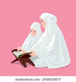 
A mother is teaching her daughter to read the Holy Koran