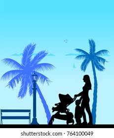 Mother walking with her children on the beach, one in the series of similar images silhouette