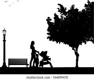 Mother walking with her children in park, one in the series of similar images silhouette