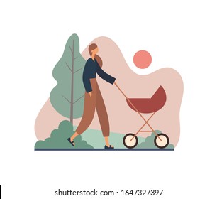 Mother walking with stroller during sunset. Modern woman in casual clothes pushing baby carriage and walking along path near tree and bushes during sunset in calm summer evening in park