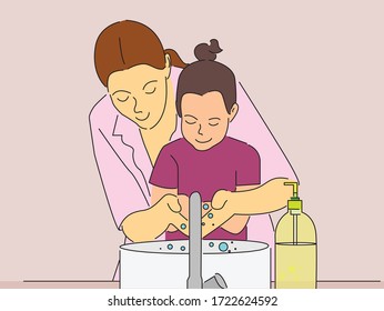 Mother Washing Her Daughter's Hands With Hand Wash