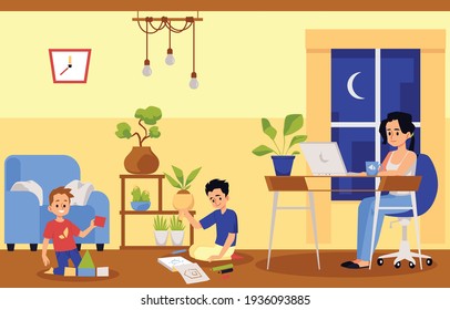 Mother working at home sitting at desk with computer near playing sons