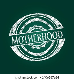 Motherhood chalk emblem written on a blackboard. Vector Illustration. Detailed.
