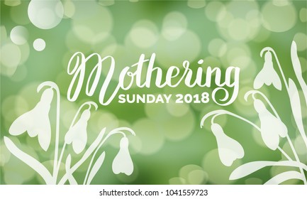 Mothering Sunday 2018 typography on blurred bokeh background with snowdrop flowers vector illustration. Hand-lettering in green color. For banner, flyer, poster, web illustration, greeting card.