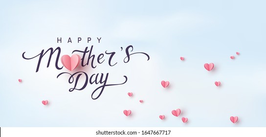 Mother's day greeting card. Vector pink love symbols in shape of heart and Happy Mother's Day calligraphy on blue sky background. 
