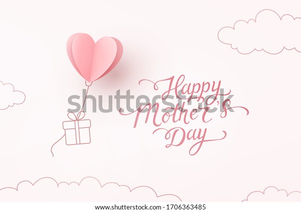 Mother\'s day greeting card. Vector flying\
heart balloon with gift box and Happy Mother\'s Day calligraphy on\
pink sky background