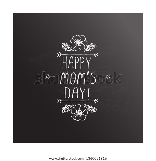 Mothers day\
handlettering element with flowers on chalkboard background. Happy\
moms day. Suitable for print and\
web