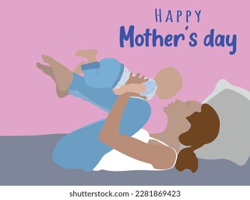 Mother's day with a mother playing with her baby lying on the floor in an affectionate attitude, with the pink background and text