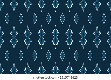 Motivo étnico ikat patrón textil sin costuras. Patrón antiguo, flores blancas, fondo azul marino.	