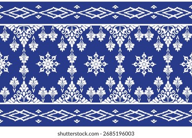 Motivo étnico ikat patrón textil sin costuras. Patrón antiguo, flores blancas, fondo azul marino.
