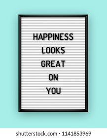 Motivation quote on white letterboard with black plastic letters. Hipster vintage inspirational poster 80x, 90x. Happiness looks great on you