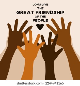 Motivational poster against racism. Hands of latin and black skin. Ethnic community.  A text about the tolerance and friendship of peoples.