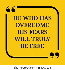 Motivational quote. He who has overcome his fears will truly be free. On yellow background.