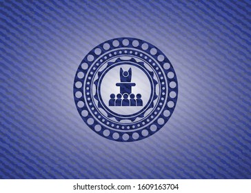 motivational speech icon inside emblem with jean background
