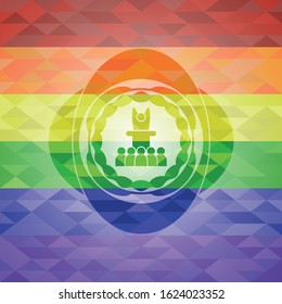 motivational speech icon inside emblem on mosaic background with the colors of the LGBT flag