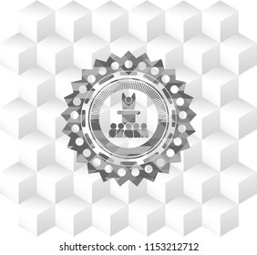 motivational speech icon inside grey badge with geometric cube white background