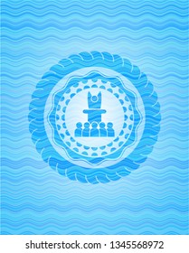motivational speech icon inside light blue water badge.