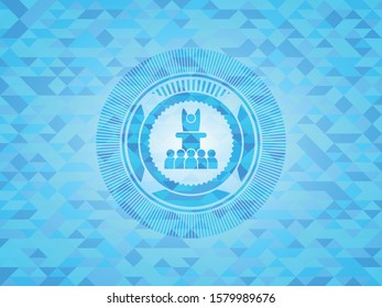 motivational speech icon inside light blue emblem with triangle mosaic background