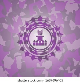 motivational speech icon inside pink and purple camouflage texture