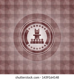 motivational speech icon inside red seamless geometric badge.