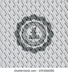 motivational speech icon inside silver badge or emblem. Scales pattern. Vector Illustration. Detailed.