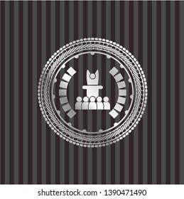 motivational speech icon inside silvery emblem