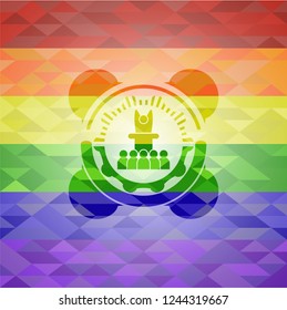 motivational speech icon on mosaic background with the colors of the LGBT flag