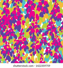 Motley abstract seamless pattern. Multicolor ovals forming flowers petals. Plain silhouettes botanical background. Good for textile and fabric.