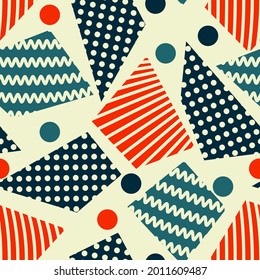 motley geometric seamless pattern. black, red, azure circles and textured abstract shapes are randomly arranged on a beige background. vector

