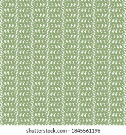 Modalidad de cebada consistente en rayas trituradas que separan algunas bandas rociadas con varios parches diminutos. Diseño textil en verde pastel y blanco.